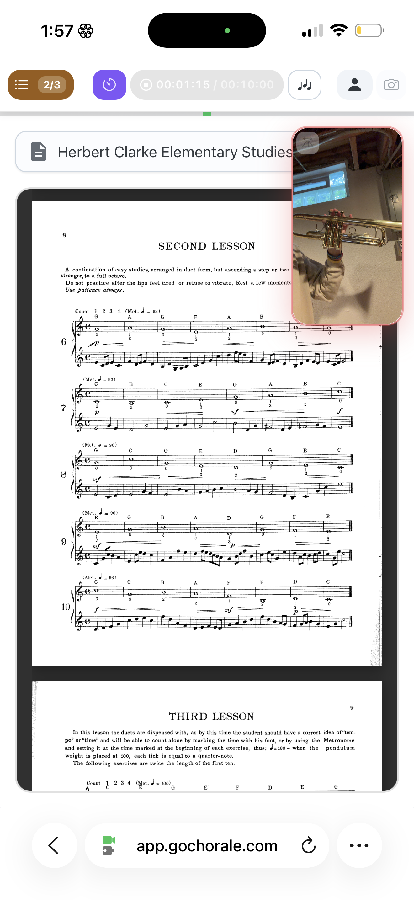 The Chorale Studio open on a phone mid-performance: sheet music, a large record button, and a live tuner.